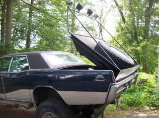 Illustration for article titled Could This 1966 Continental 4X4 Pull $9,000?